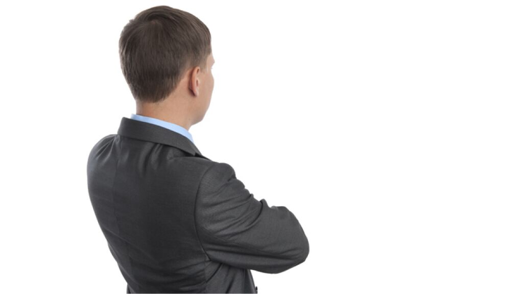 Thought back. Thought back. парень бизнесмен со спины. человек размышляет. Thought back.