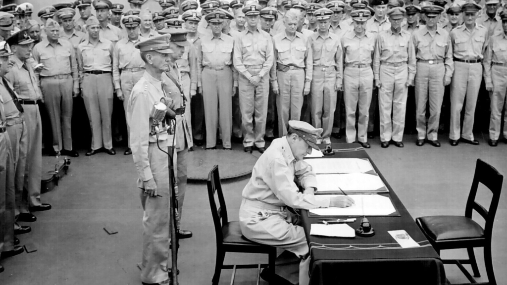 170623-Douglas_MacArthur_signs_formal_surrender.jpg