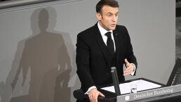 Macron Speaks in the ‘Language of the Old Enemy’